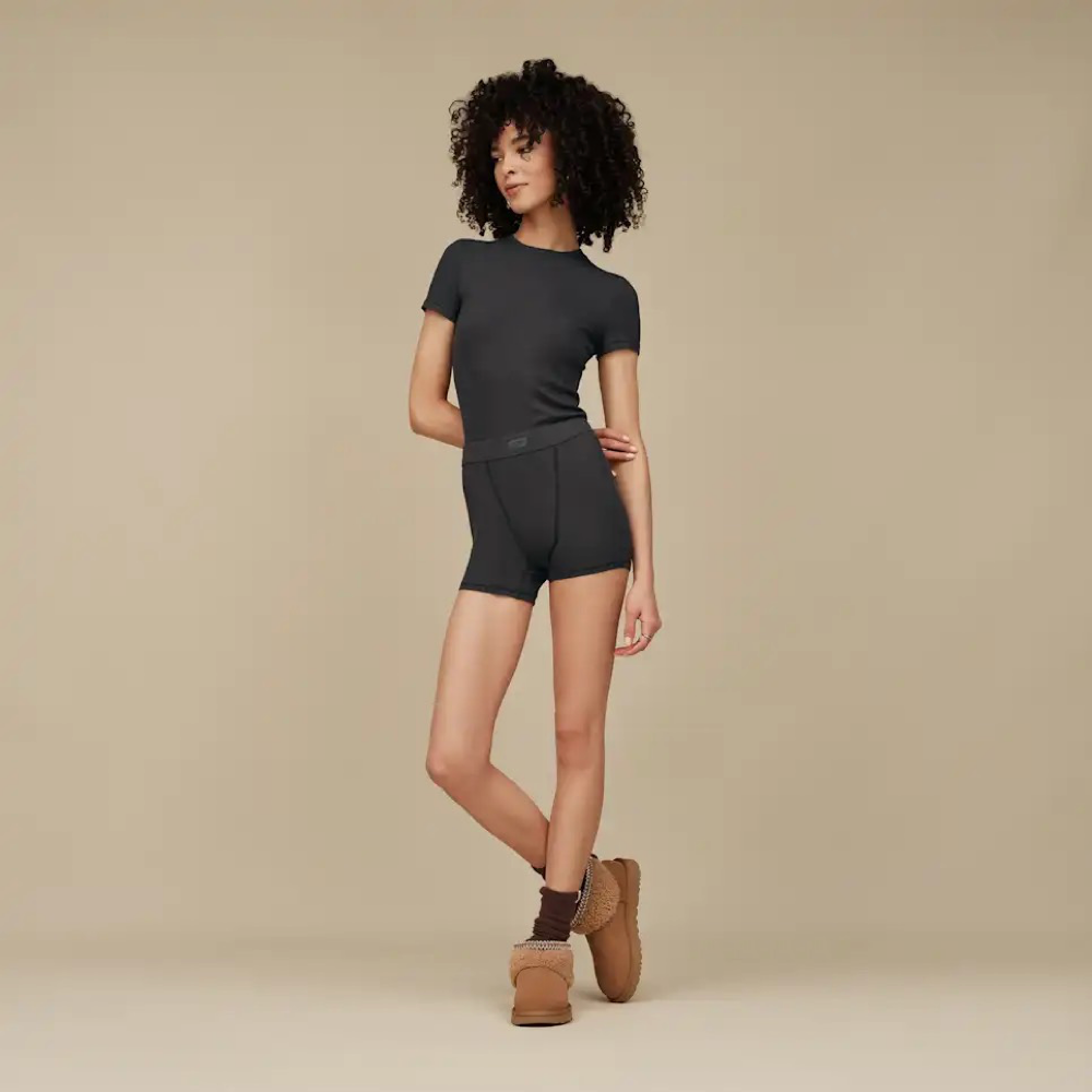 Model view of Ugg Classic Ultra Mini Maxi Curly Boot for women.