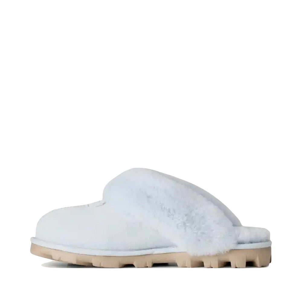 Side (left) view of Ugg Coquette Sheepskin Slide Slipper for women.