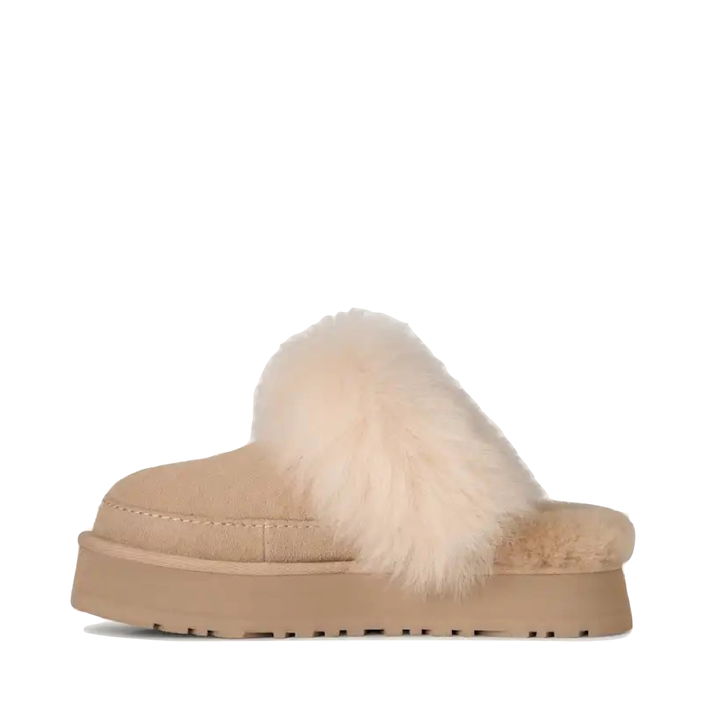 Side (left) view of Ugg Disquette Chalet Slipper for women.