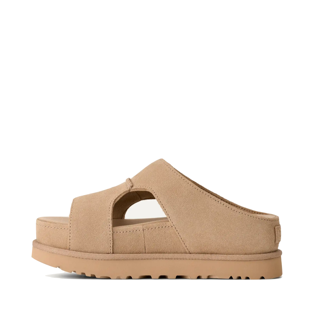 Side (left) view of Ugg Goldenstar Hi Cutout Slide Sandal for women.