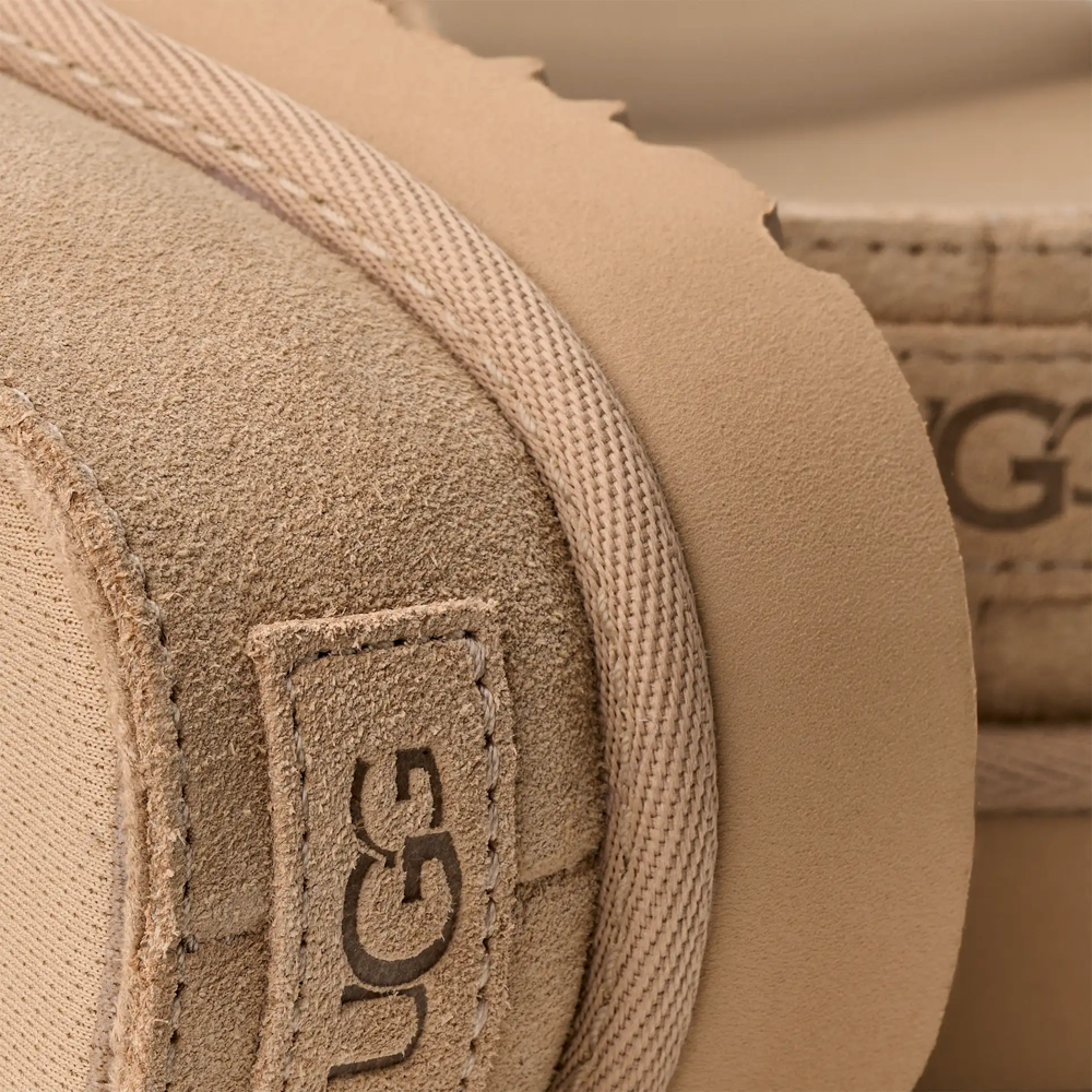 Detail view of Ugg Goldenstar Hi Cutout Slide Sandal for women.