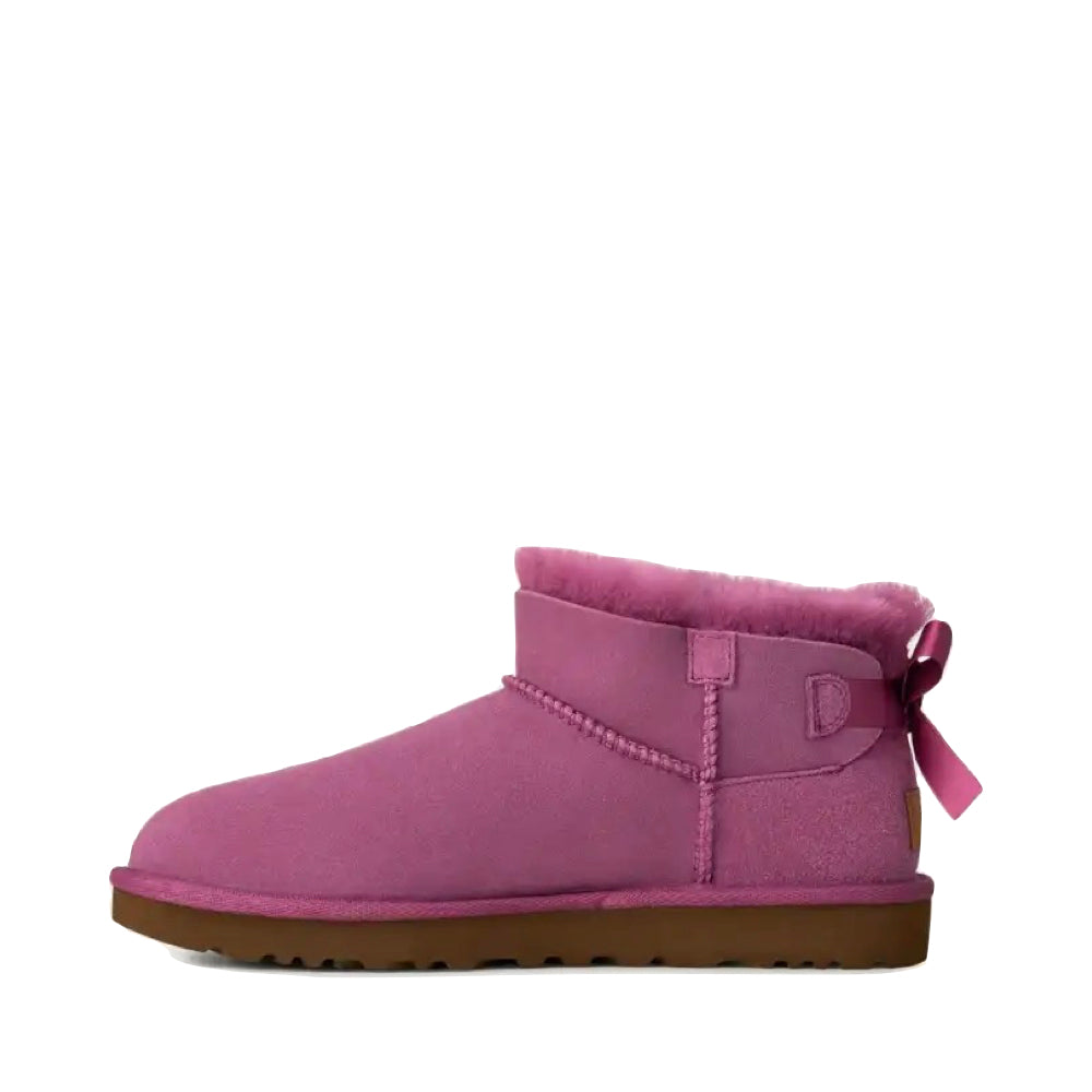 Side (left) view of Ugg Ultra Mini Bailey Bow Boot for women.