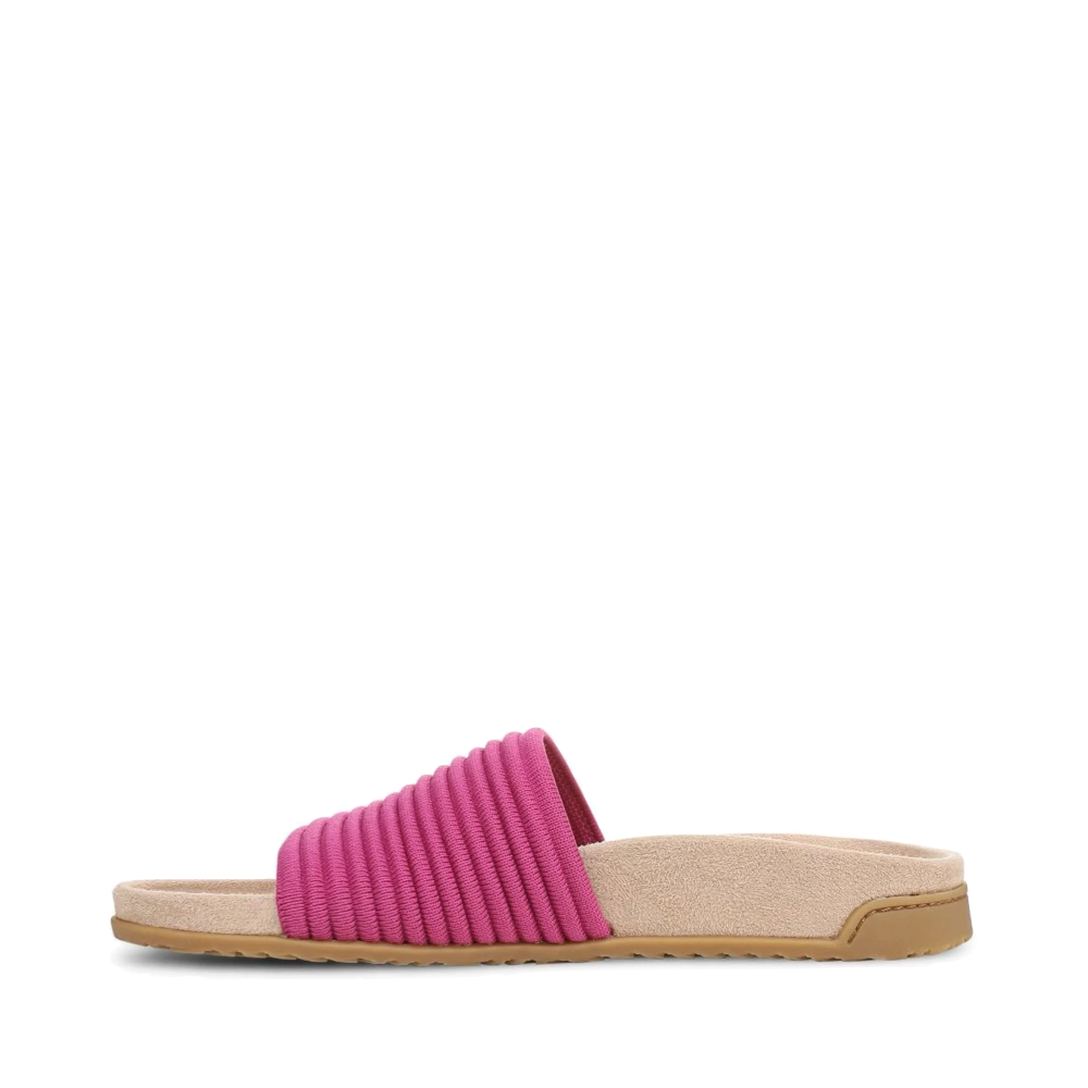 Side (left) view of Vionic Evie Knit Slide Flip Sandal for women.