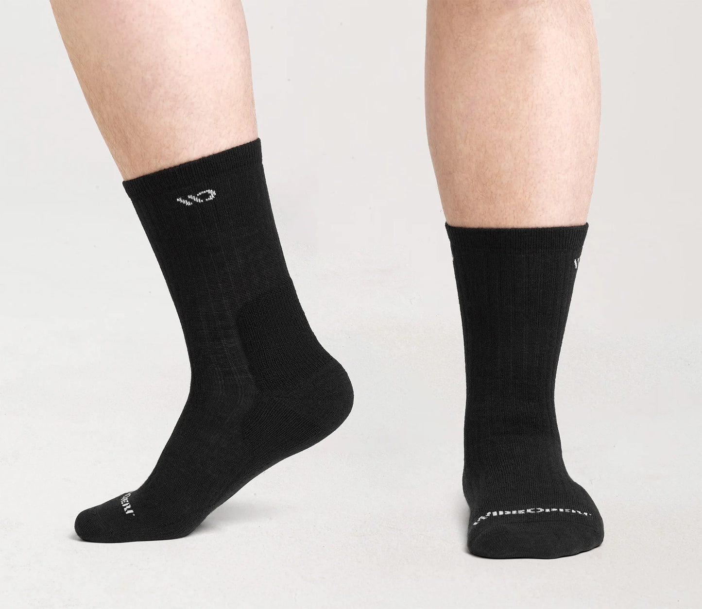 Wide Open by Darn Tough Men's Solid Cushioned Micro Crew Sock in Black