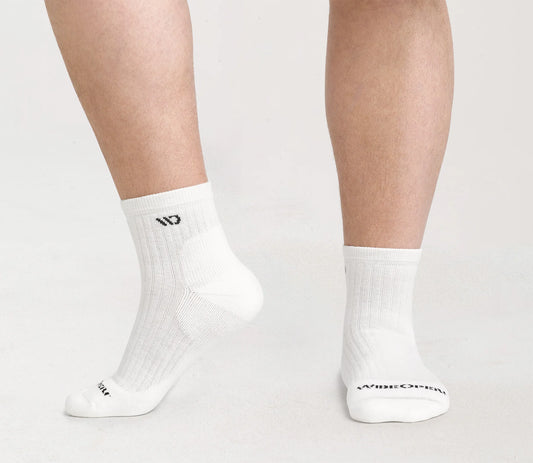 Wide Open by Darn Tough Men's Solid Cushioned Quarter Sock in White