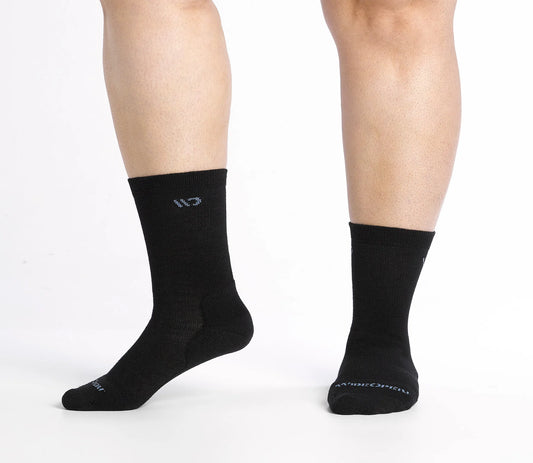 Wide Open by Darn Tough Women's Solid Cushioned Crew Socks in Black