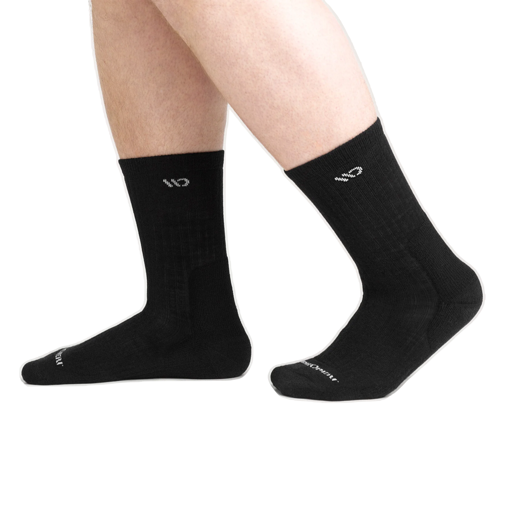 Model view of Wide Open by Darn Tough Solid Cushion Micro Crew Sock for men.