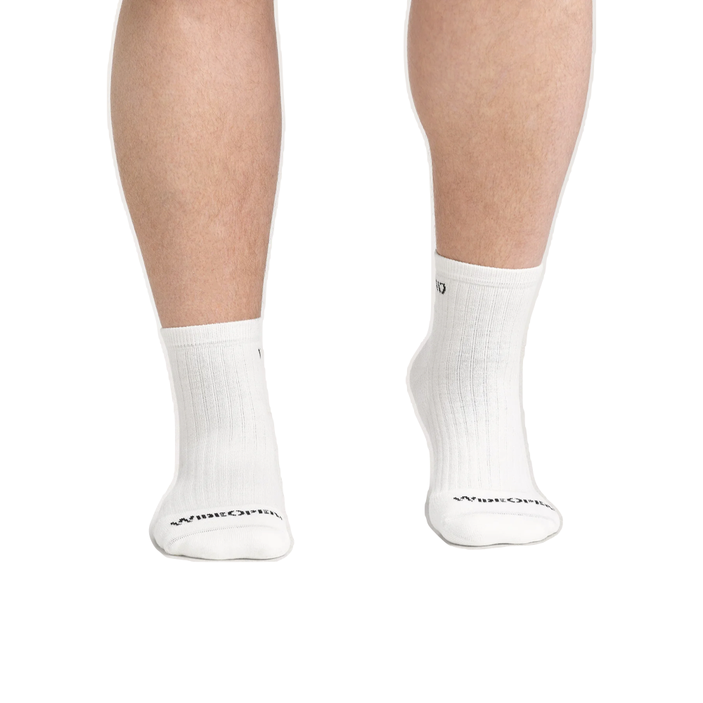 Model view of Wide Open by Darn Tough Solid Cushioned Quarter Sock for men.