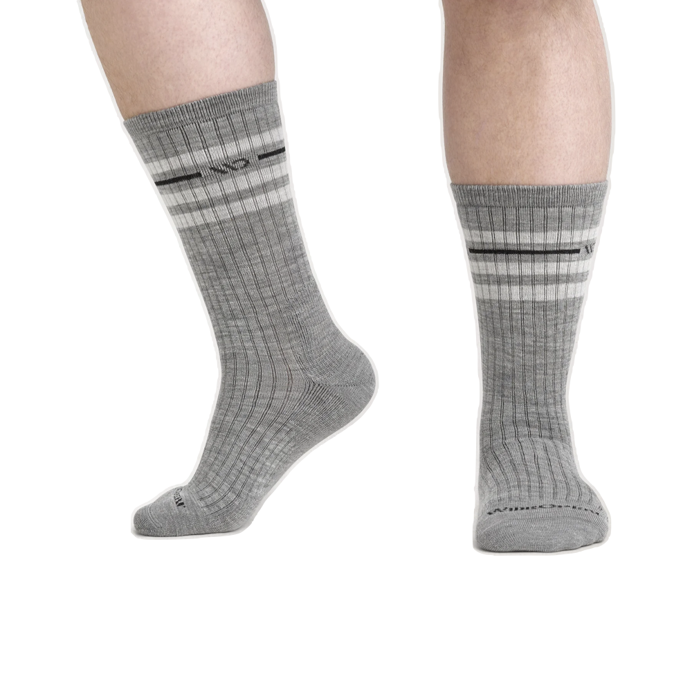 Model view of Wide Open by Darn Tough Vintage Stripe Cushioned Crew Socks for men.