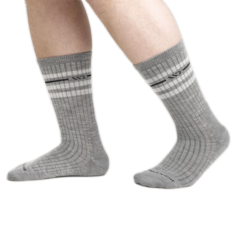 Model view of Wide Open by Darn Tough Vintage Stripe Cushioned Crew Socks for men.