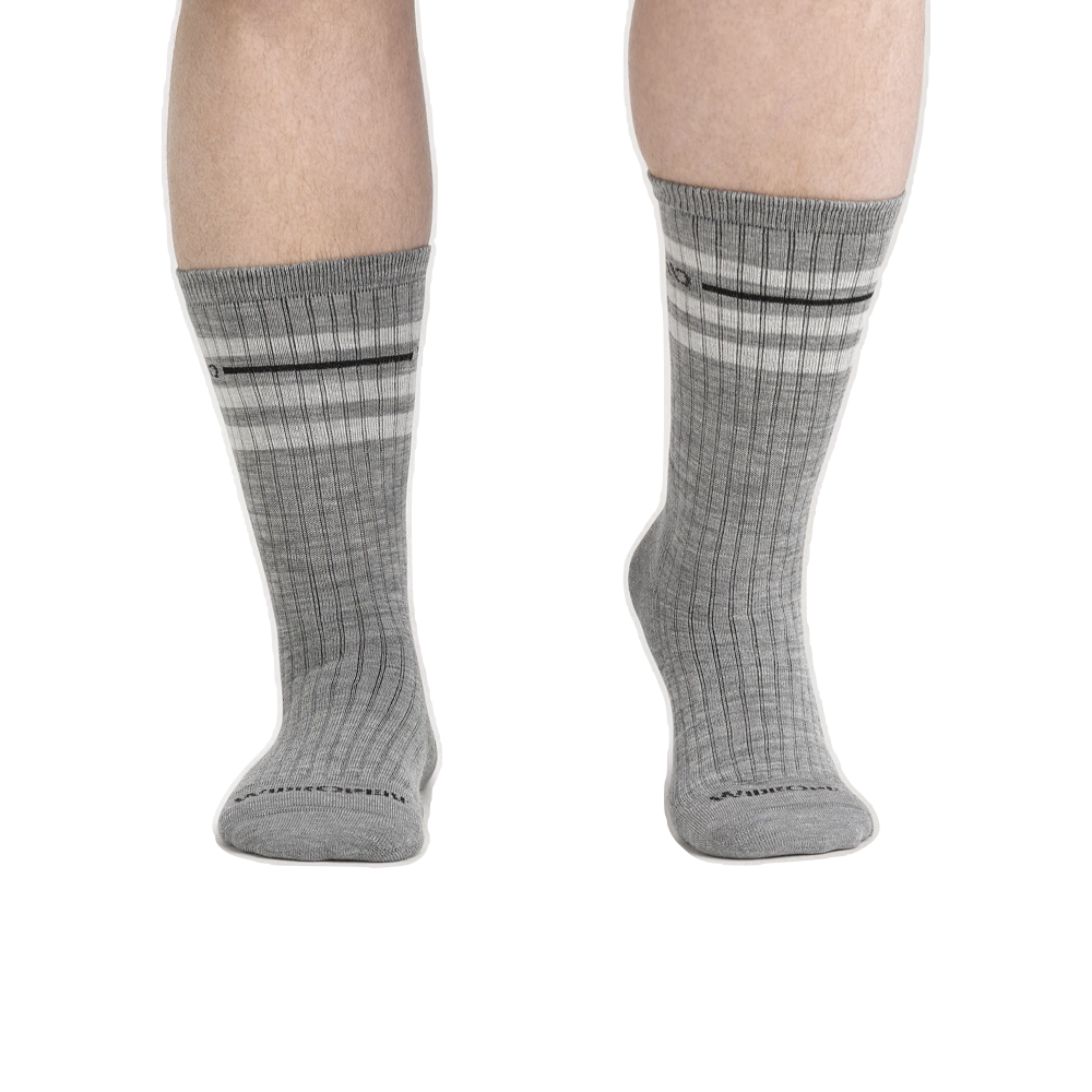 Model view of Wide Open by Darn Tough Vintage Stripe Cushioned Crew Socks for men.