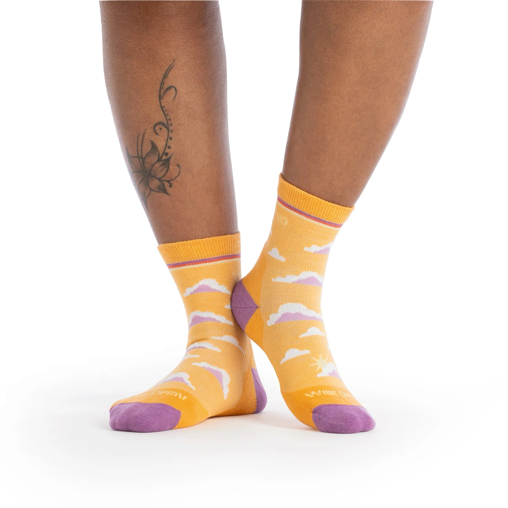 Model view of Wide Open By Darn Tough Cloud Hopper Cushioned Micro Crew Sock for women.