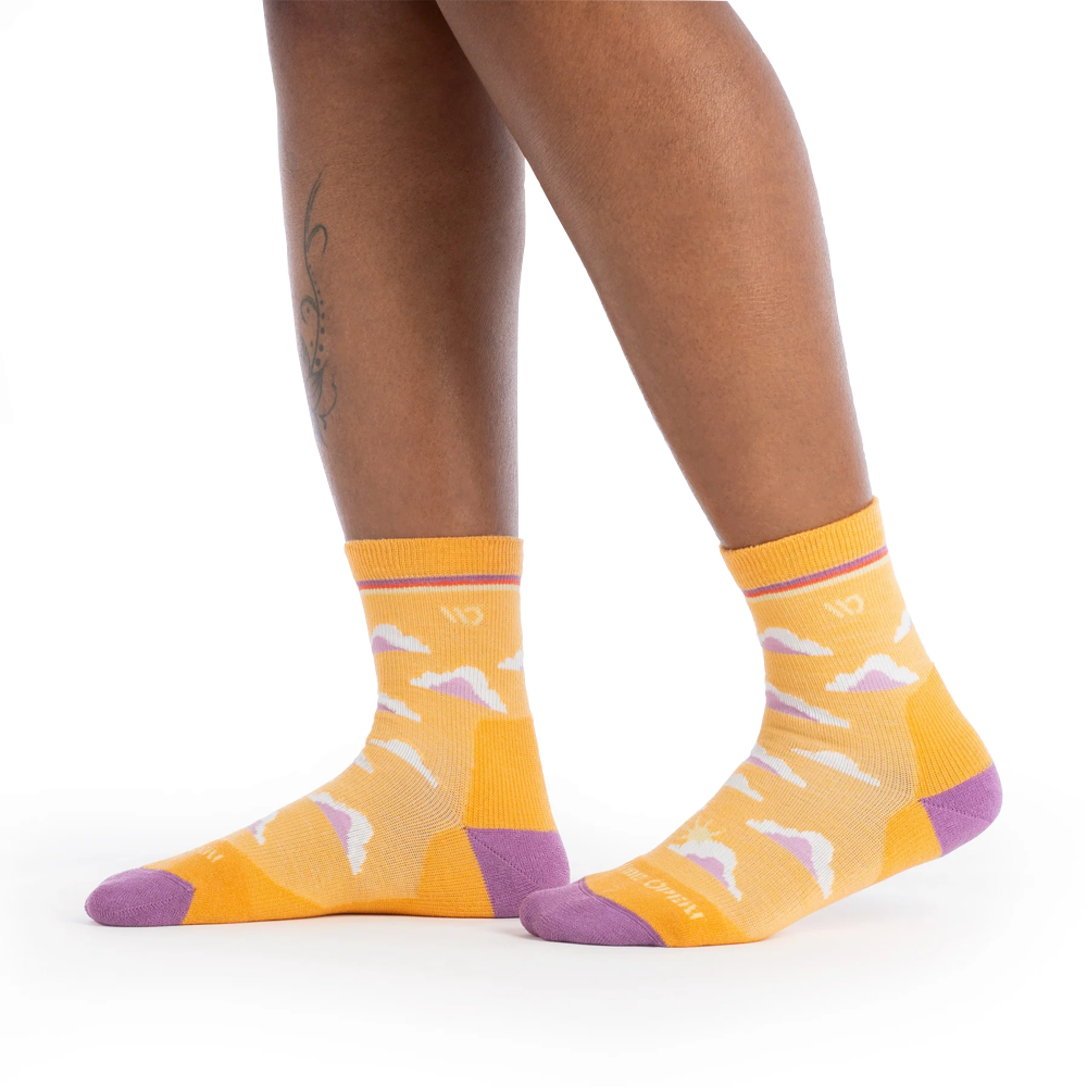 Model view of Wide Open By Darn Tough Cloud Hopper Cushioned Micro Crew Sock for women.