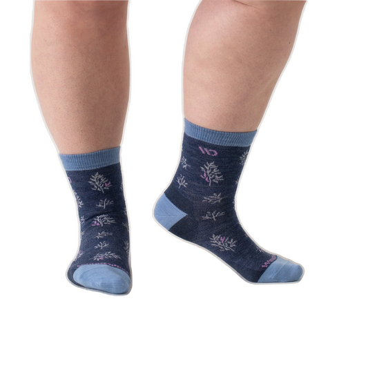 Model view of Wide Open by Darn Tough Foliage No Cushion Micro Crew Sock for women.