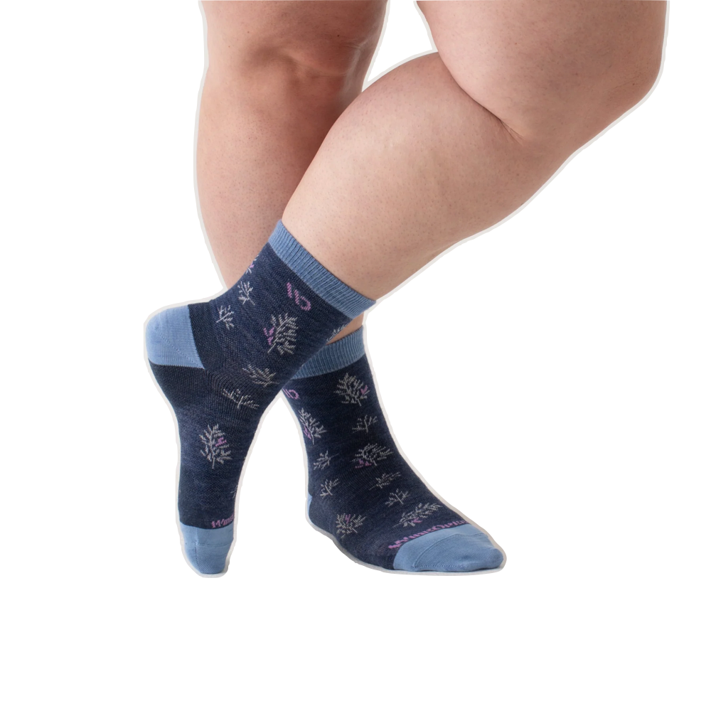 Model view of Wide Open by Darn Tough Foliage No Cushion Micro Crew Sock for women.