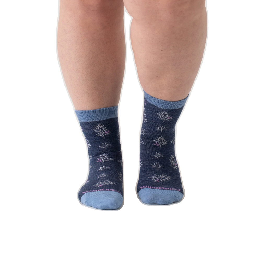 Model view of Wide Open by Darn Tough Foliage No Cushion Micro Crew Sock for women.