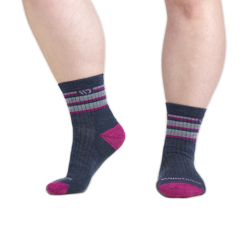 Model view of Wide Open by Darn Tough Multi Stripe Cushioned Micro Crew Sock for women.