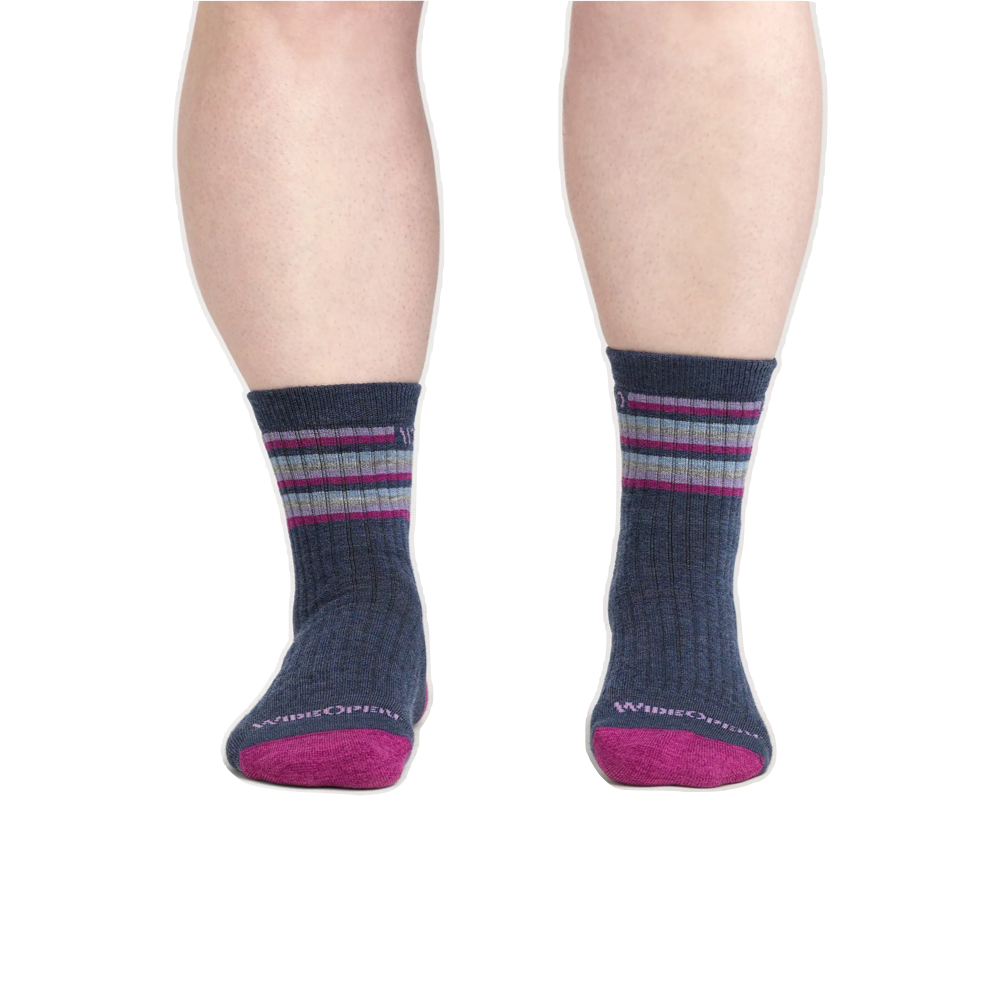 Model view of Wide Open by Darn Tough Multi Stripe Cushioned Micro Crew Sock for women.