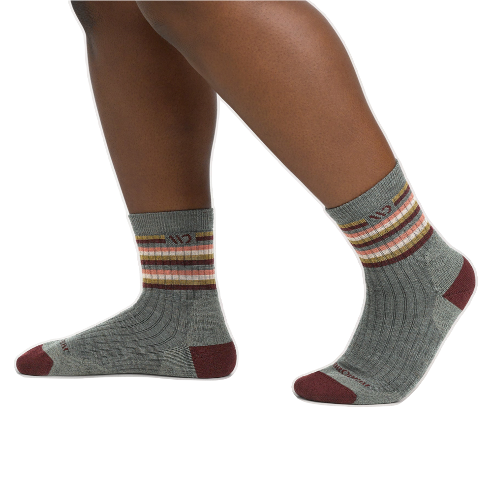 Model view of Wide Open by Darn Tough Multi Stripe Cushioned Micro Crew Sock for women.