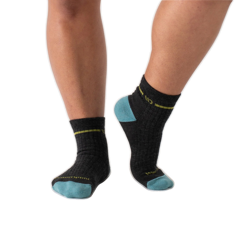 Model view of Wide Open by Darn Tough Single Stripe Cushioned Quarter Sock for women.