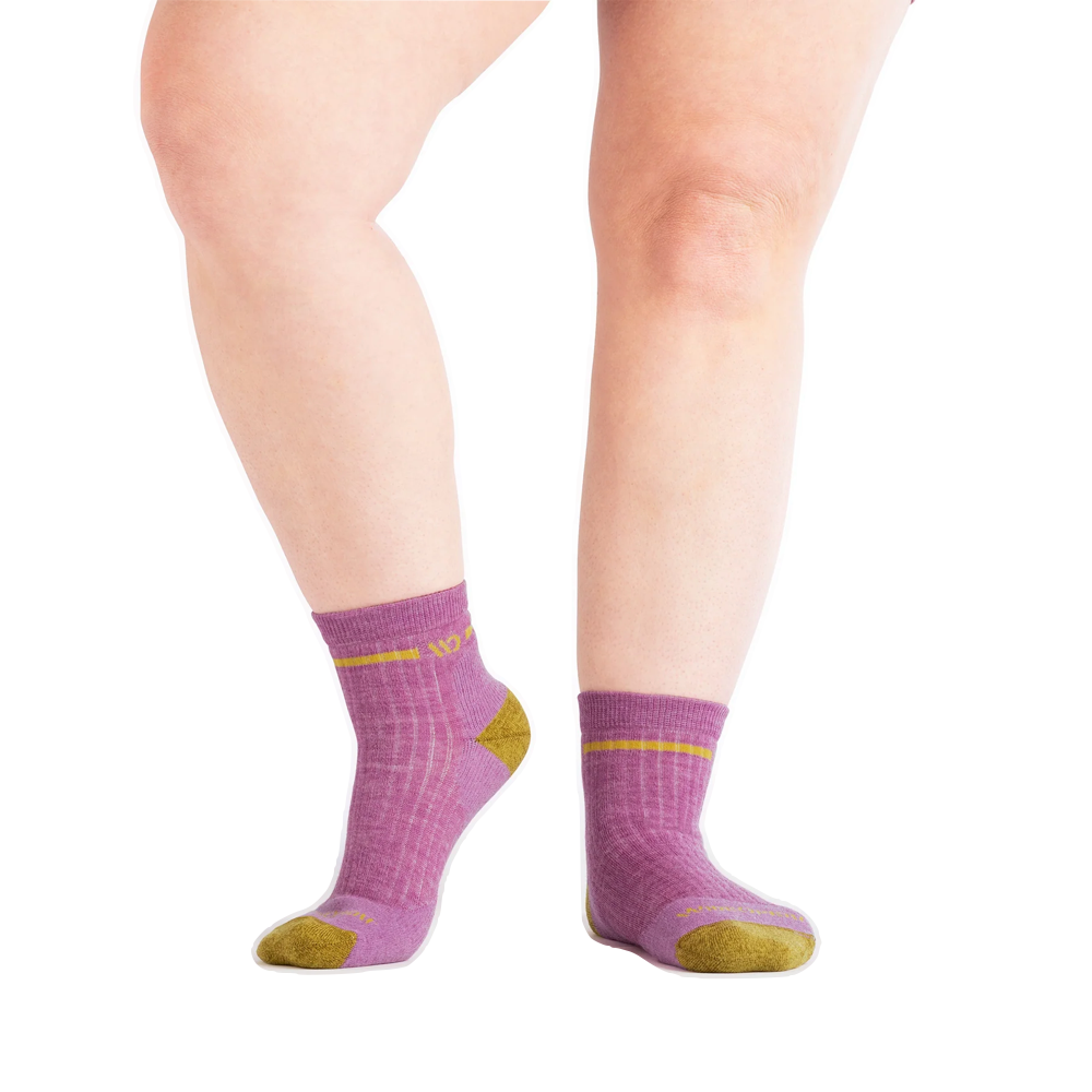 Model view of Wide Open by Darn Tough Single Stripe Cushioned Quarter Sock for women.