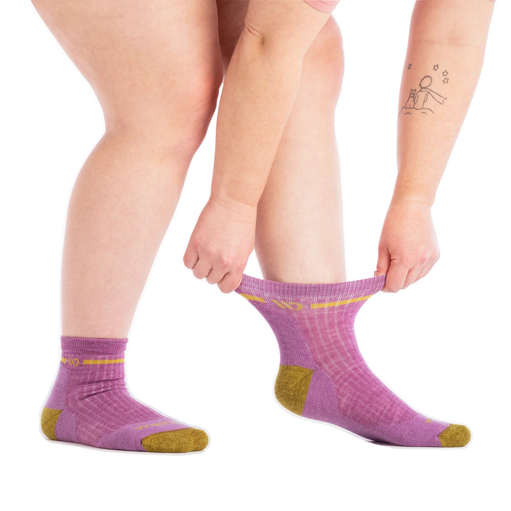 Model view of Wide Open by Darn Tough Single Stripe Cushioned Quarter Sock for women.