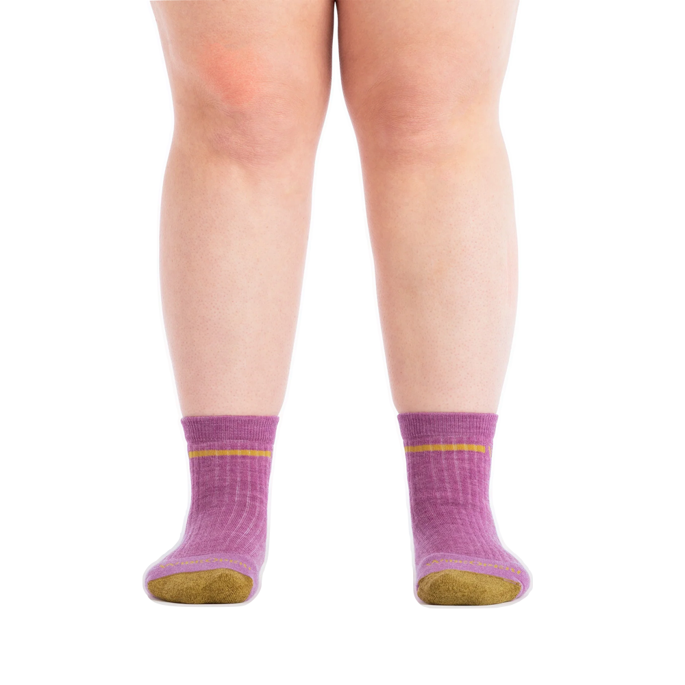 Model view of Wide Open by Darn Tough Single Stripe Cushioned Quarter Sock for women.