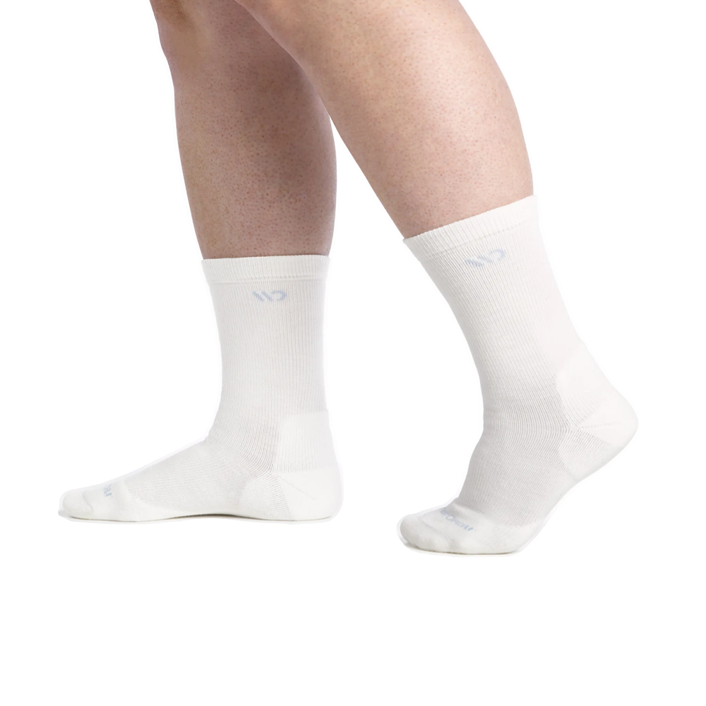 Model view of Wide Open by Darn Tough Solid Cushioned Crew Sock for women.