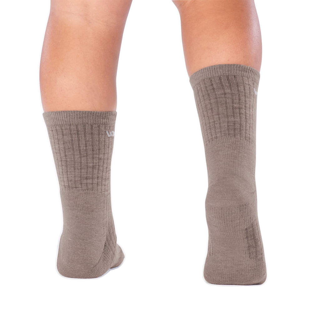 Model (back) view of Wide Open by Darn Tough Solid Cushioned Micro Crew Socks for men.