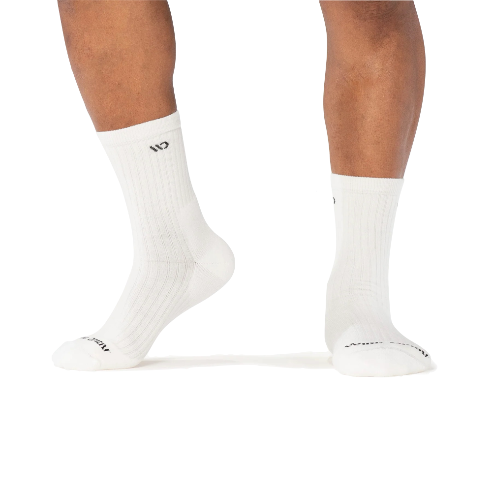 Model view of Wide Open by Darn Tough Solid Cushioned Micro Crew Socks for men.