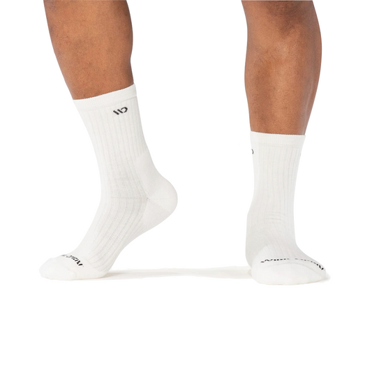 Model view of Wide Open by Darn Tough Solid Cushioned Micro Crew Socks for men.
