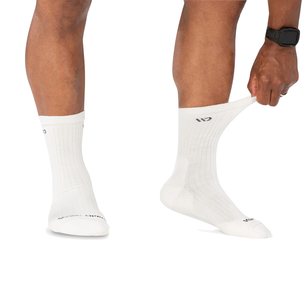 Model view of Wide Open by Darn Tough Solid Cushioned Micro Crew Socks for men.