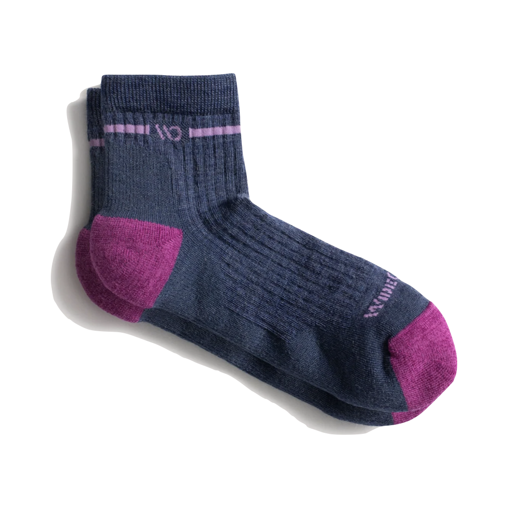 Side (right) view of Wide Open by Darn Tough Single Stripe Cushioned Quarter Sock for women.