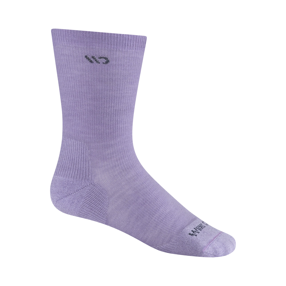 Side (right) view of Wide Open by Darn Tough Solid Cushioned Crew Socks for women.