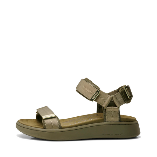 Side (left) view of Woden Line Strap Sandal for women.
