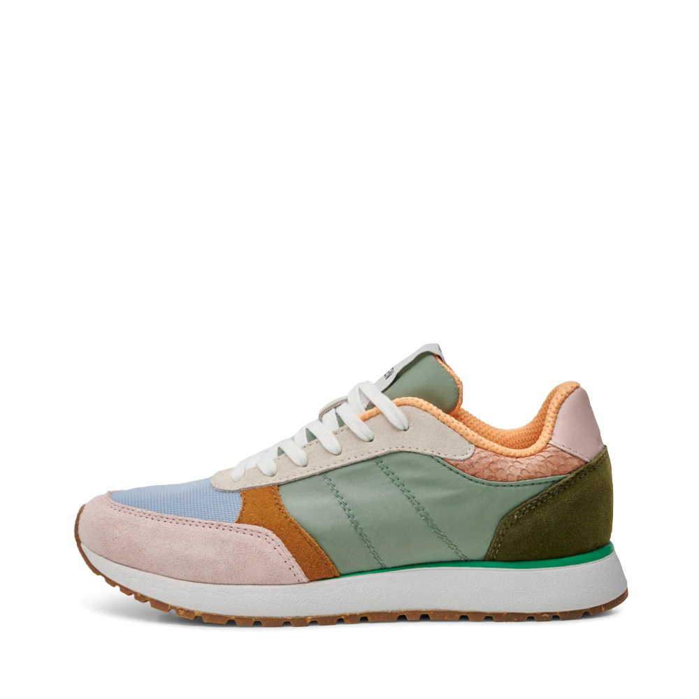 Side (left) view of Woden Ronja Sneaker for women.