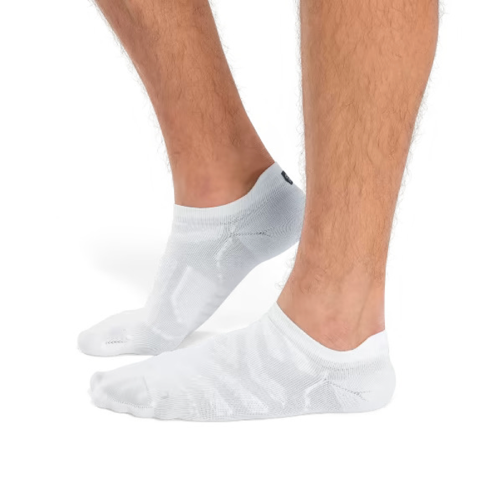 Side (left) view on model of On Performance Low sock for men.