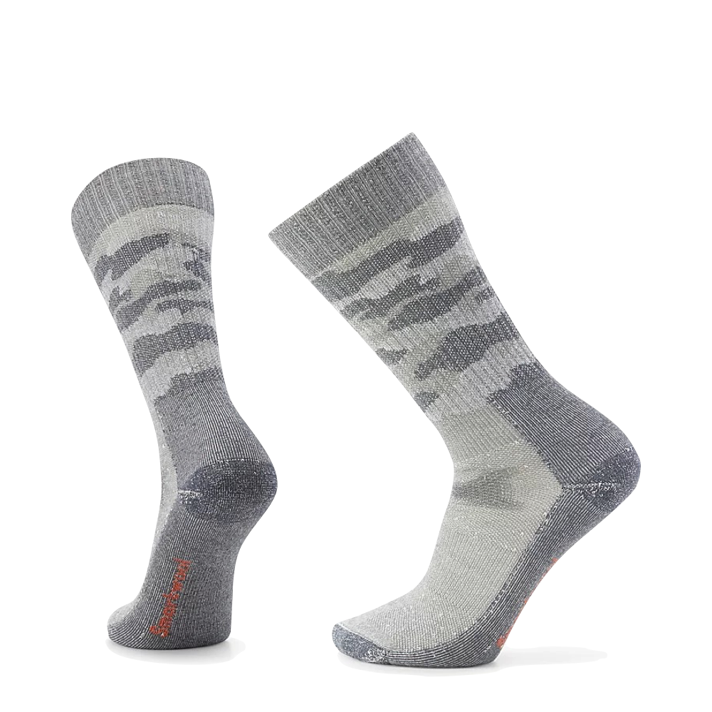Side (left) view of Smartwool Hunt Classic Edition Full Cushion Camo Tall Crew socks for men.